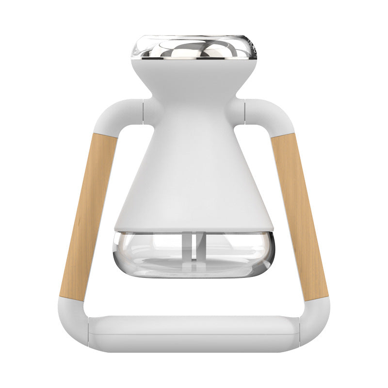 USB Wireless Charging Desktop Ultrasonic Humidifier with mist and charging feature, designed for small spaces.