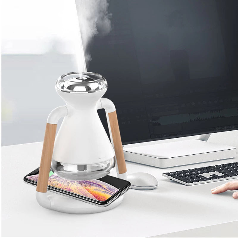 USB Wireless Charging Desktop Ultrasonic Humidifier with mist and charging feature, designed for small spaces.