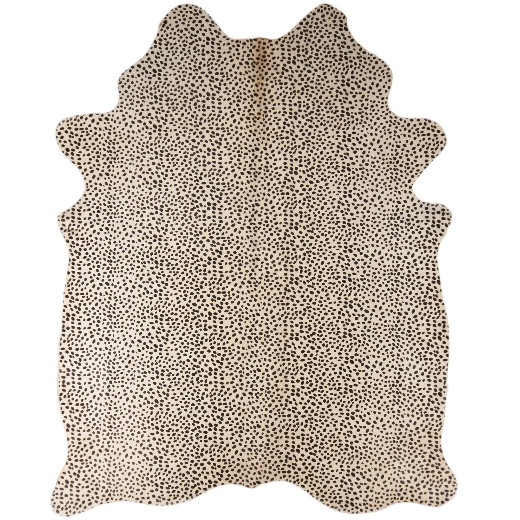 Unieke koeienhuid met dalmatiërprint, perfect als vloerkleed, met een speelse uitstraling.