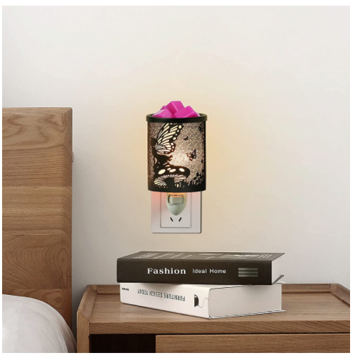 Metal Wall-Plug Wax Melt Warmer featuring elegant metal patterns, designed for aromatherapy and as a night light.