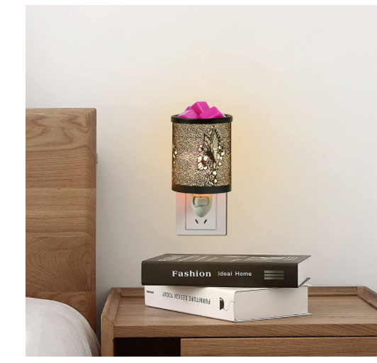 Metal Wall-Plug Wax Melt Warmer featuring elegant metal patterns, designed for aromatherapy and as a night light.