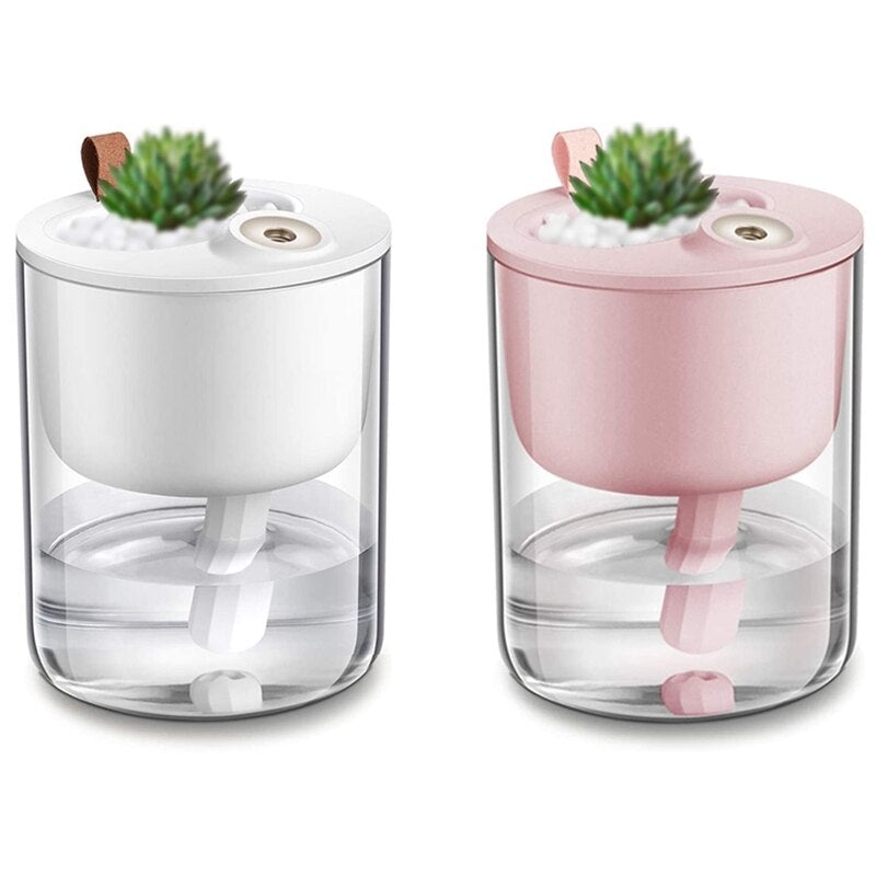 Quiet Mini Humidifier in pink and white, showcasing its compact bottle design and LED night light feature, perfect for home and office use.