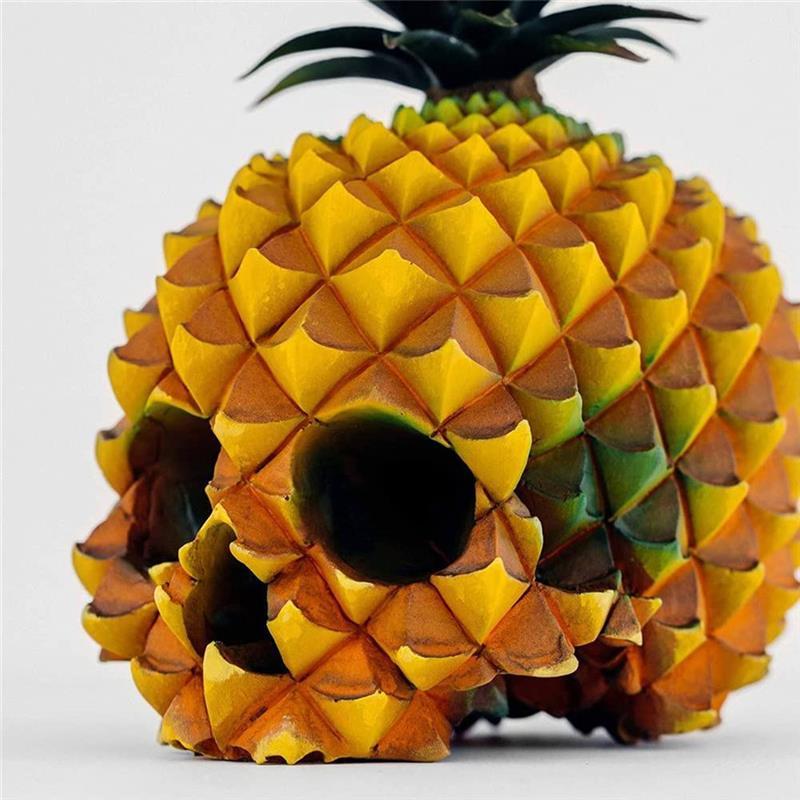 A beautifully crafted resin pineapple skeleton statue, showcasing intricate details and a unique design, perfect for home decor and organization.