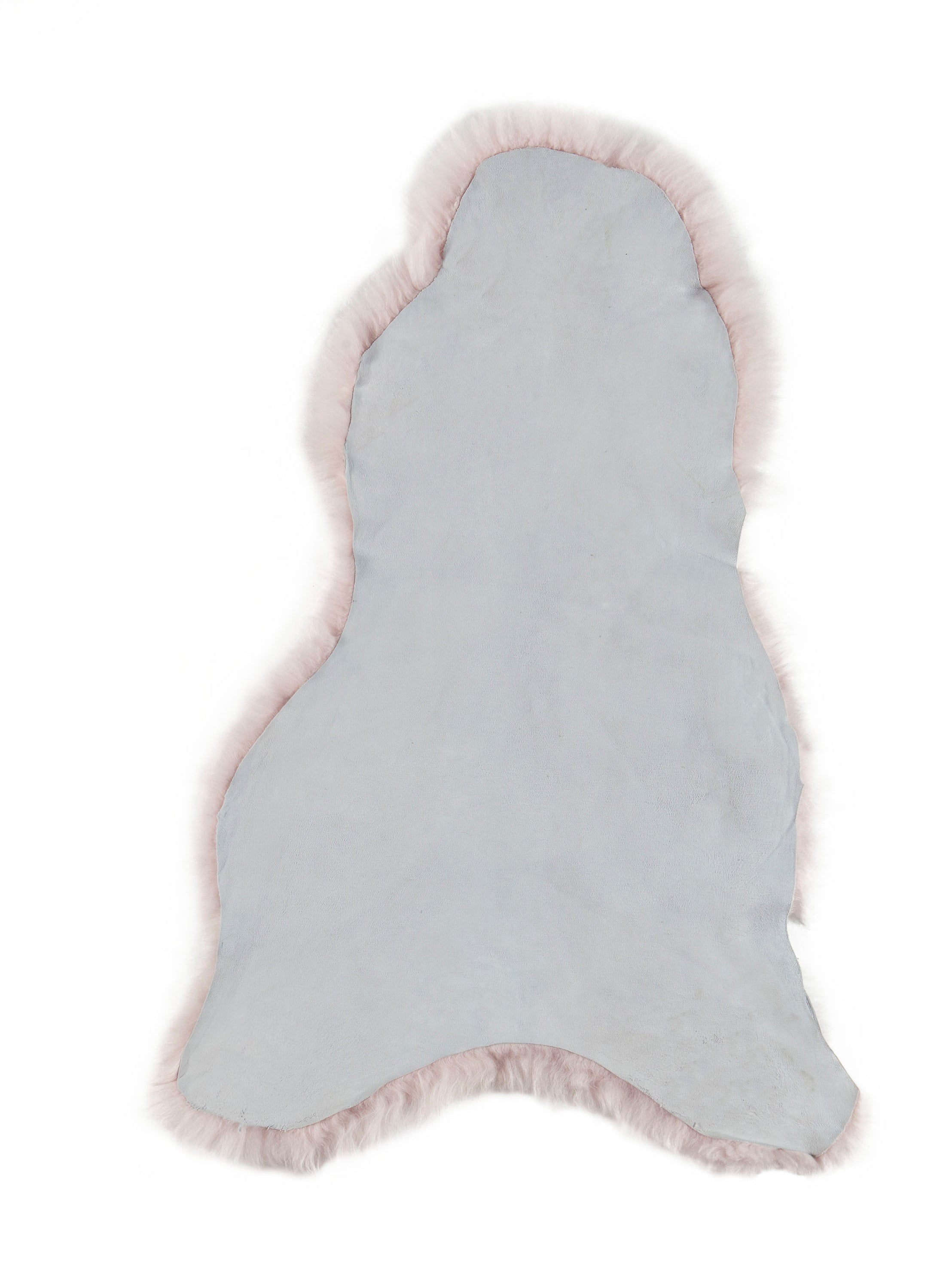 Lichtroze IJslandse schapenvacht van 100 x 65 cm, zacht en wollig, perfect voor interieurdecoratie.