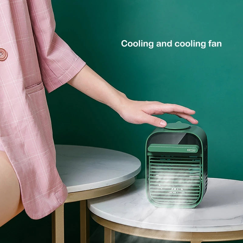 Small Portable USB Cooling Fan with water tank and adjustable wind direction, ideal for home and office use.
