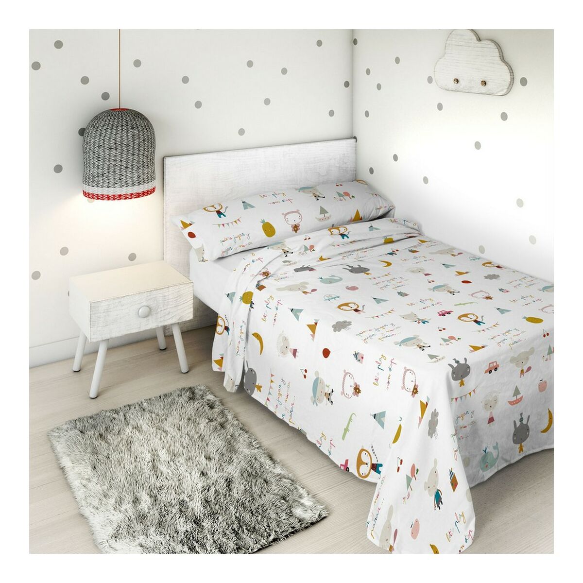 Children's bedroom with animal-themed bed.