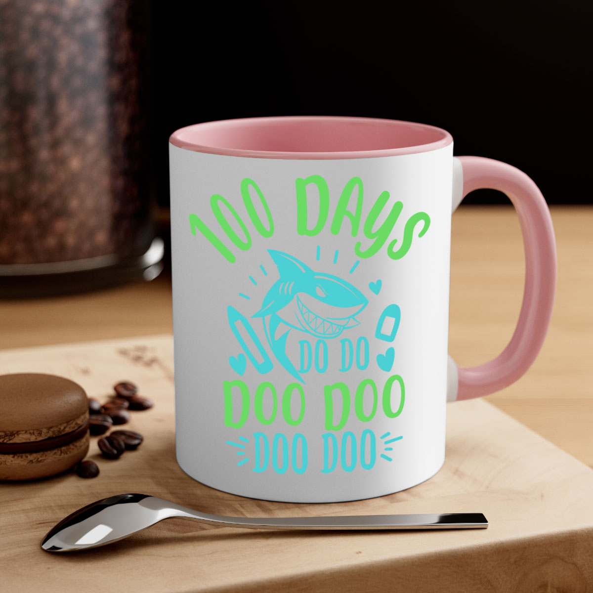 A stylish two-tone ceramic mug featuring the 100 days shark doo doo design, available in multiple colors with a glossy finish.