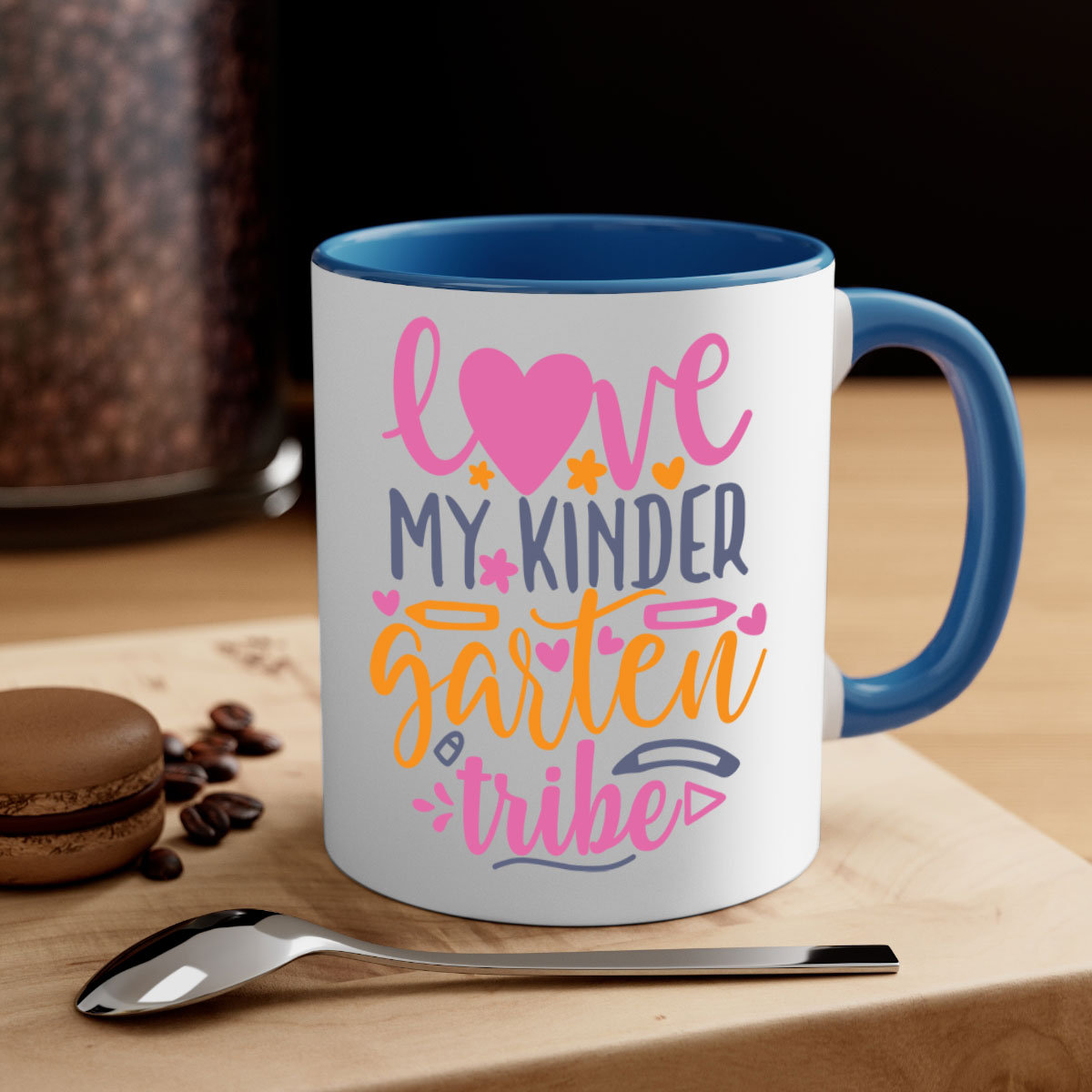 Ceramic '100 Love My Kindergarten Tribe' mug with colorful handle and interior, available in two sizes.