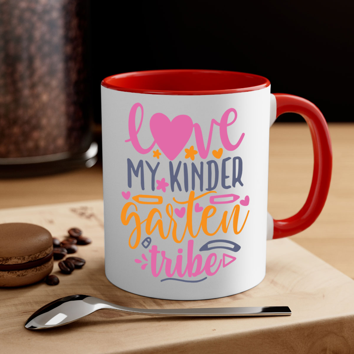 Ceramic '100 Love My Kindergarten Tribe' mug with colorful handle and interior, available in two sizes.
