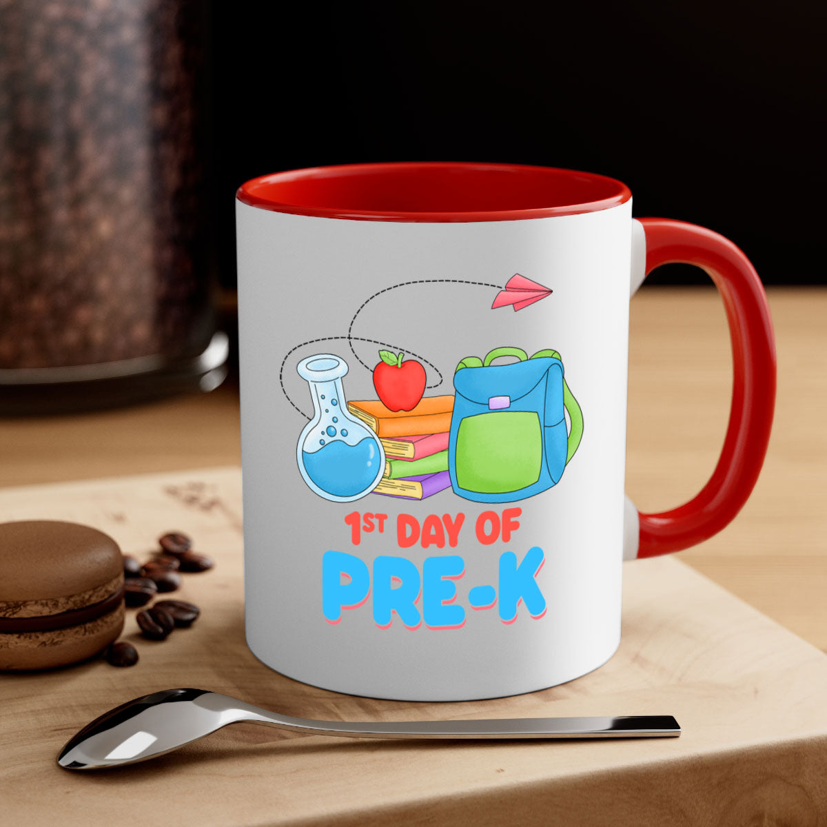 A two-tone ceramic coffee mug celebrating the 1st day of PreK, featuring a colored handle and glossy finish.