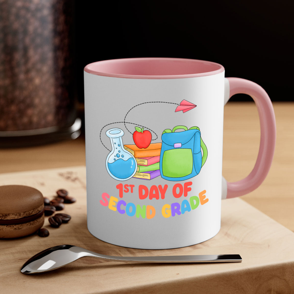 A colorful two-tone ceramic mug celebrating the 2nd day of 2nd grade, featuring a glossy finish and easy-grip handle.