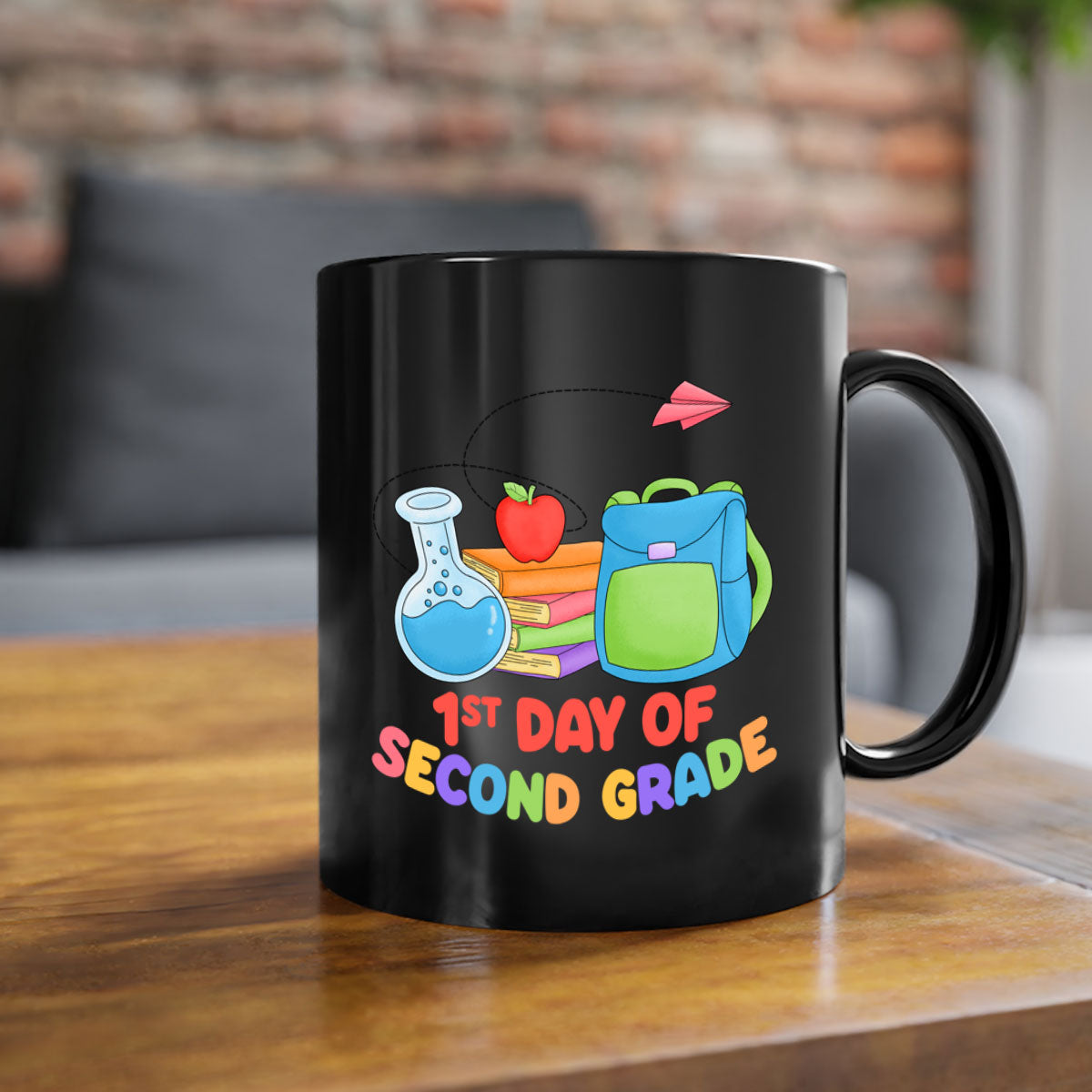 A colorful two-tone ceramic mug celebrating the 2nd day of 2nd grade, featuring a glossy finish and easy-grip handle.