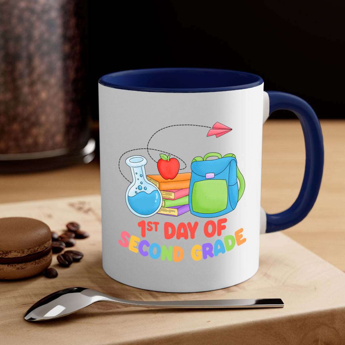 A colorful two-tone ceramic mug celebrating the 2nd day of 2nd grade, featuring a glossy finish and easy-grip handle.