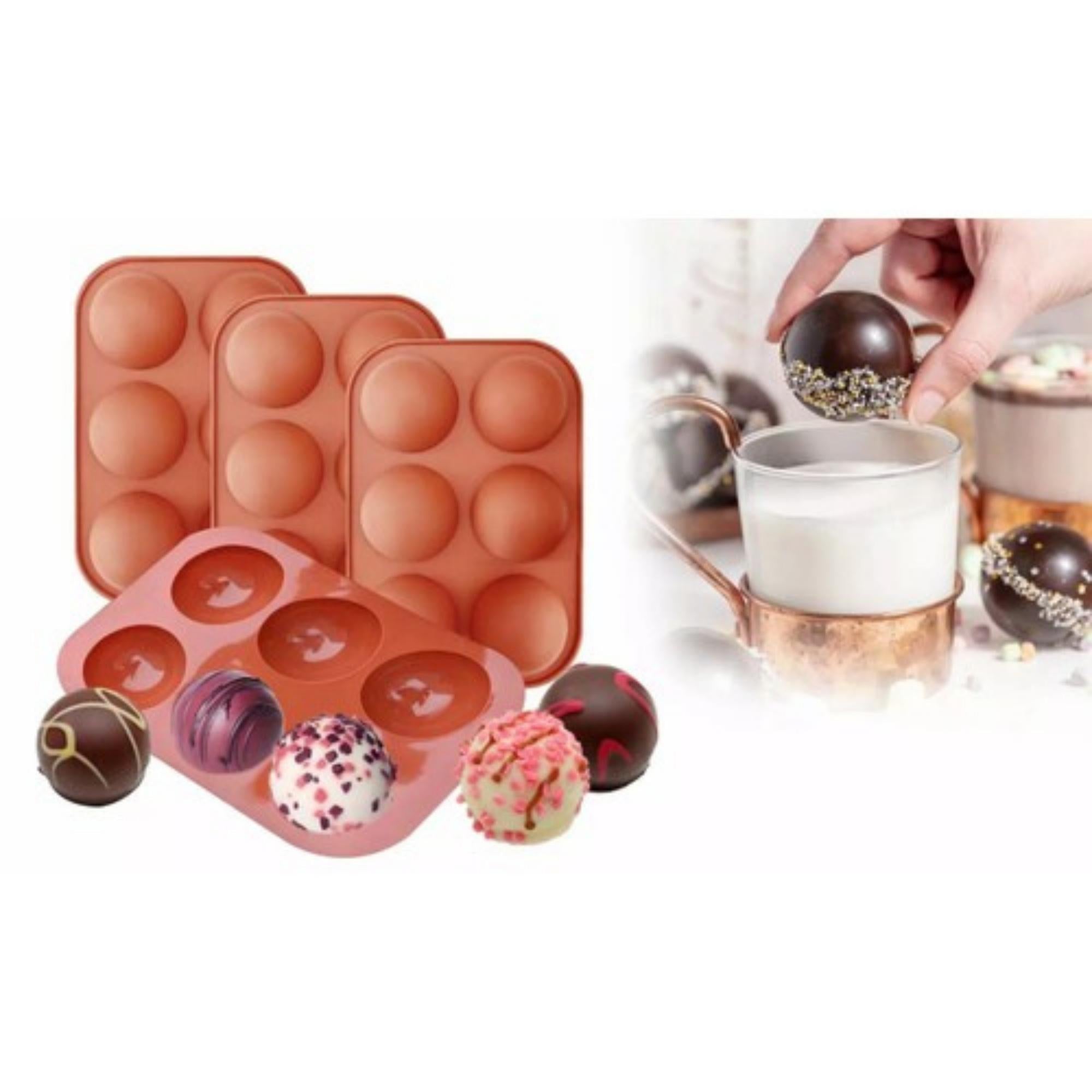 Three red silicone molds for making semi-sphere chocolate bombs, featuring six compartments each.