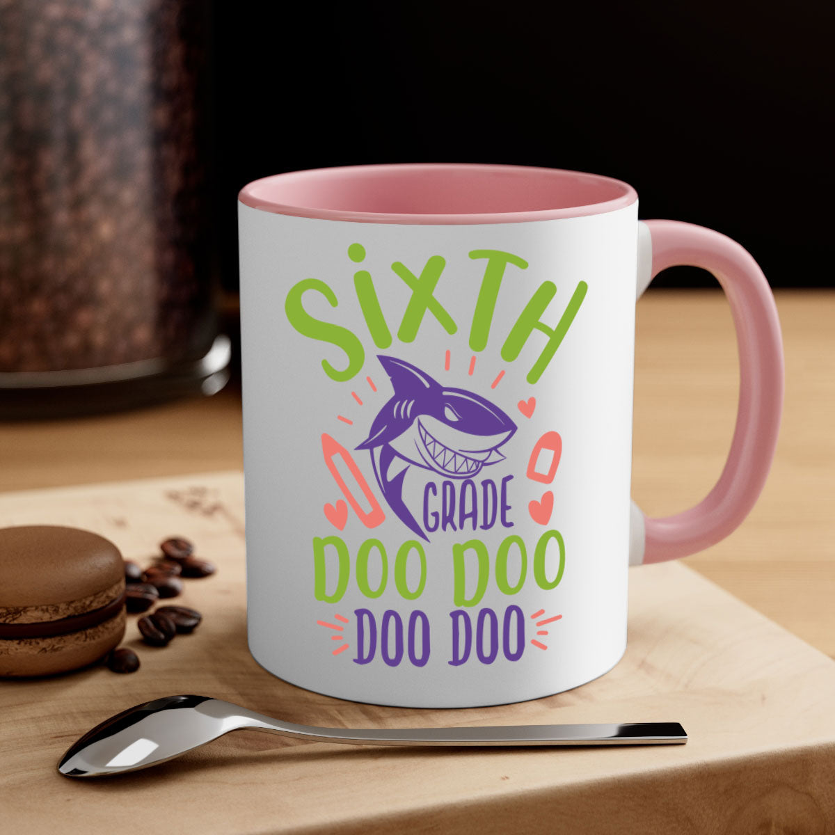 A colorful two-tone 6th grade doo doo mug with a glossy finish, featuring a colored handle and interior, available in multiple sizes.