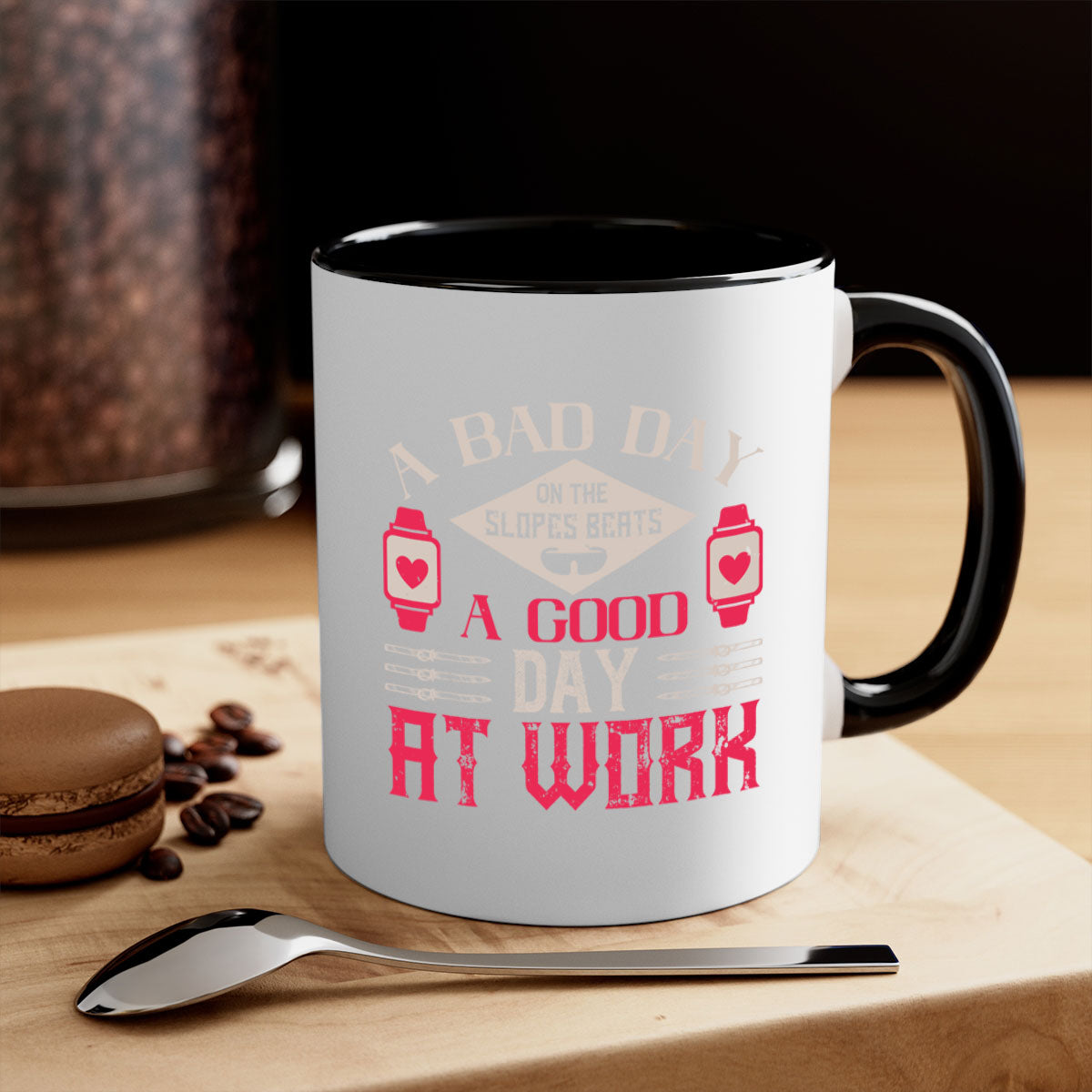 A stylish two-tone ceramic mug with the phrase 'A bad day on the slopes beats a good day at work' printed on it, featuring a colored handle and glossy finish.