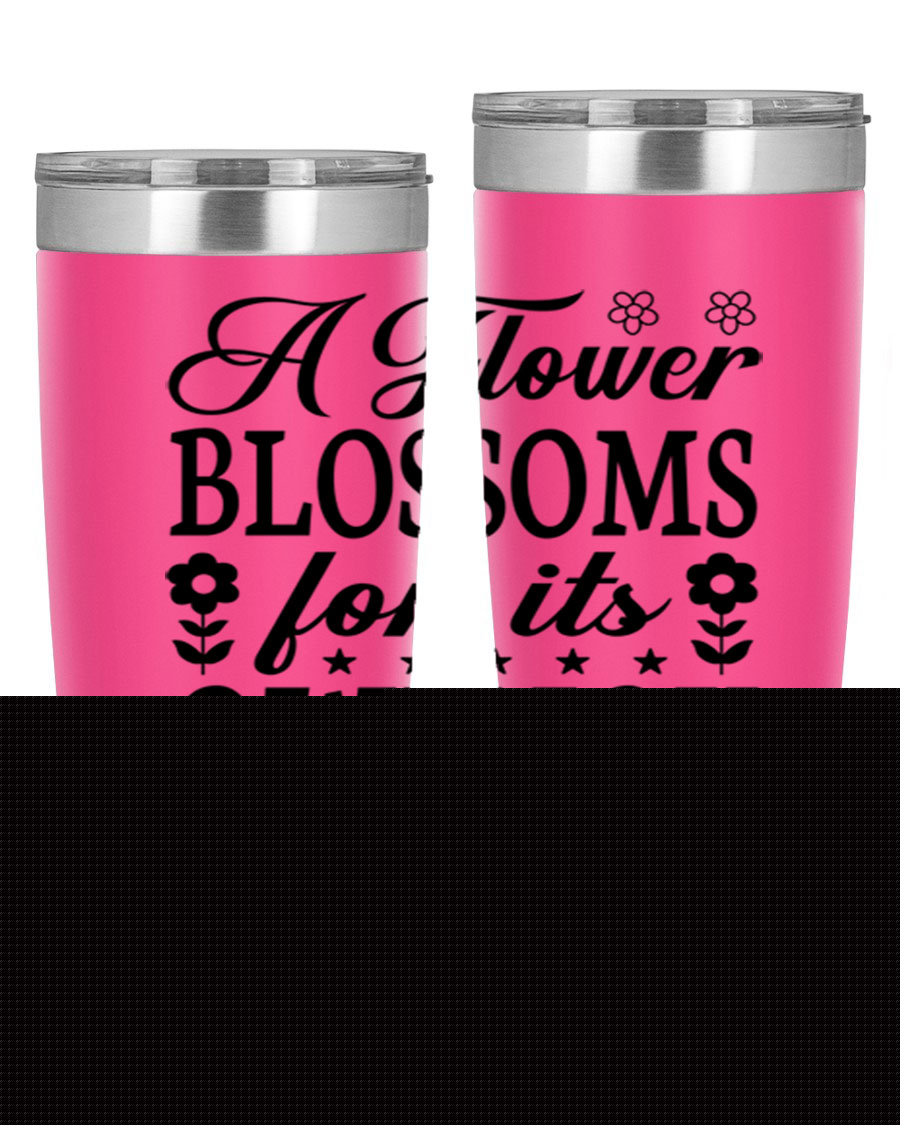 A stylish 20oz stainless steel tumbler featuring a floral design, perfect for keeping beverages hot or cold.