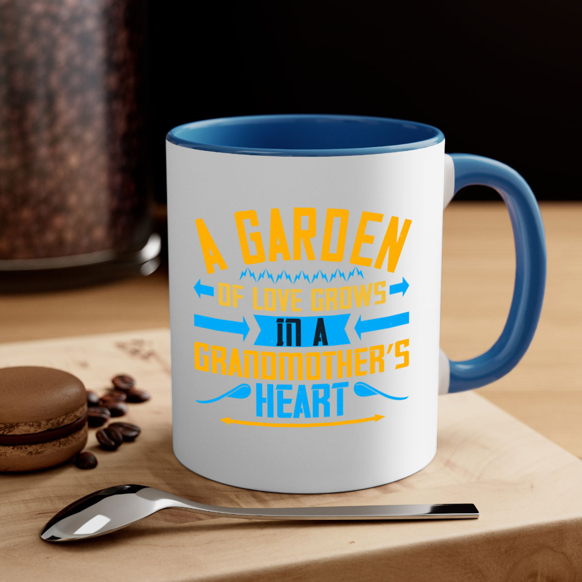 A two-tone ceramic mug featuring the phrase 'A garden of love grows in a grandmother’s heart' with a glossy finish and colored handle.
