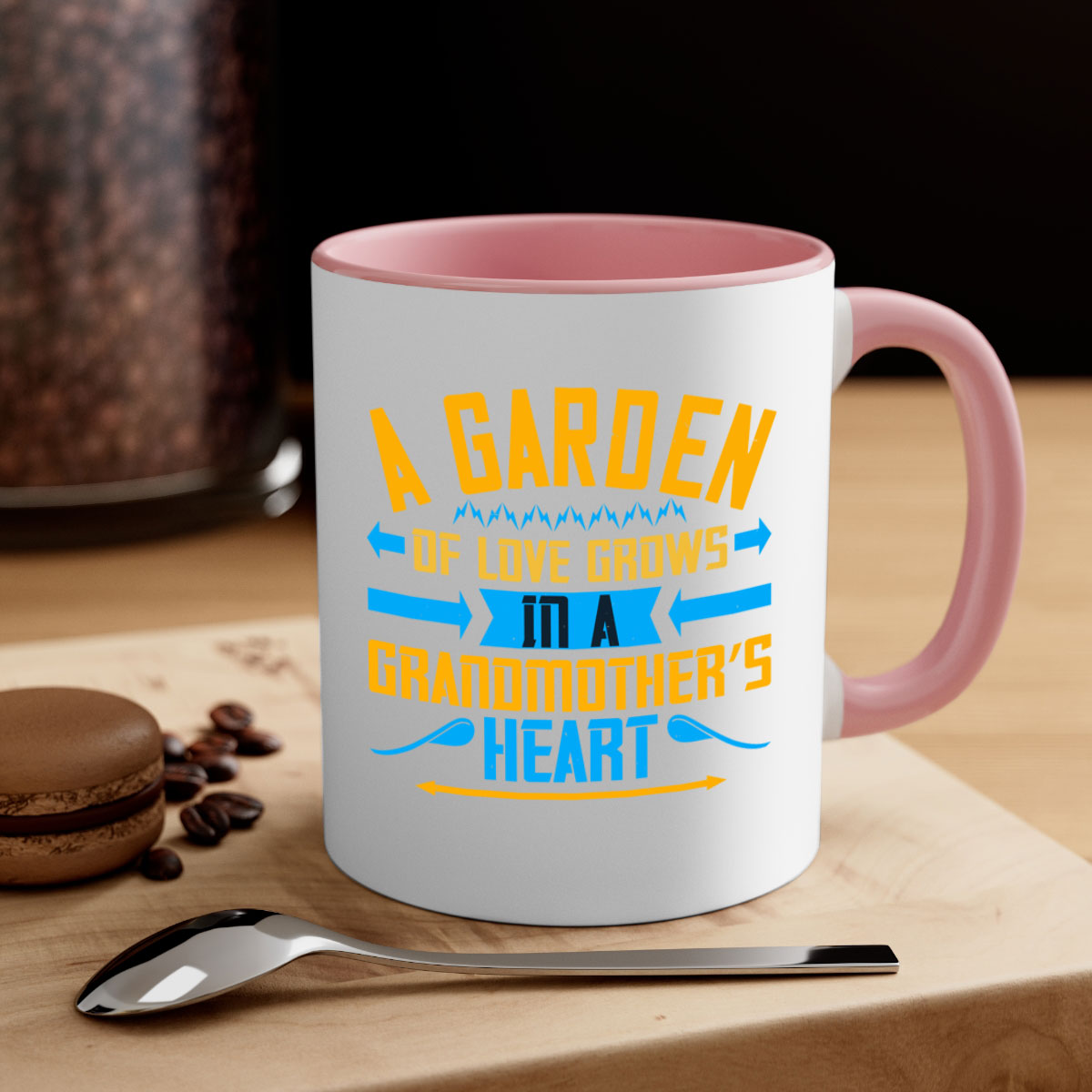 A two-tone ceramic mug featuring the phrase 'A garden of love grows in a grandmother’s heart' with a glossy finish and colored handle.