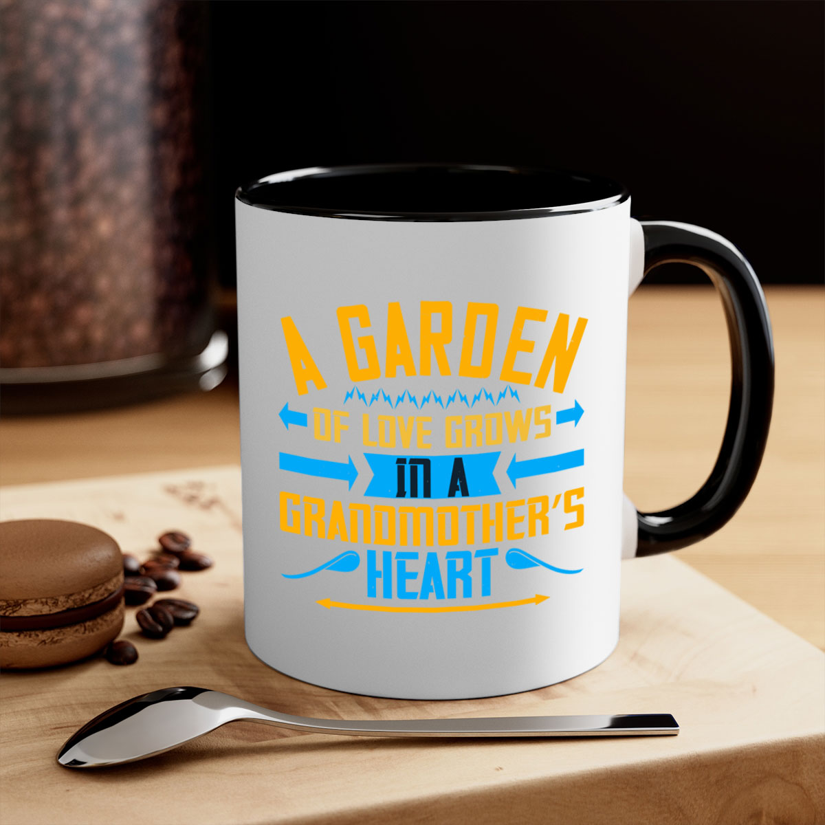 A two-tone ceramic mug featuring the phrase 'A garden of love grows in a grandmother’s heart' with a glossy finish and colored handle.