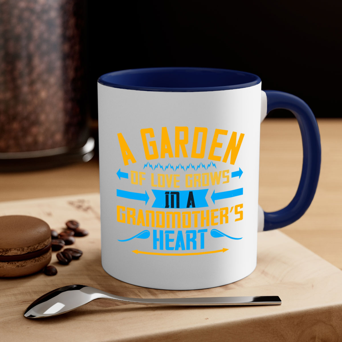 A two-tone ceramic mug featuring the phrase 'A garden of love grows in a grandmother’s heart' with a glossy finish and colored handle.