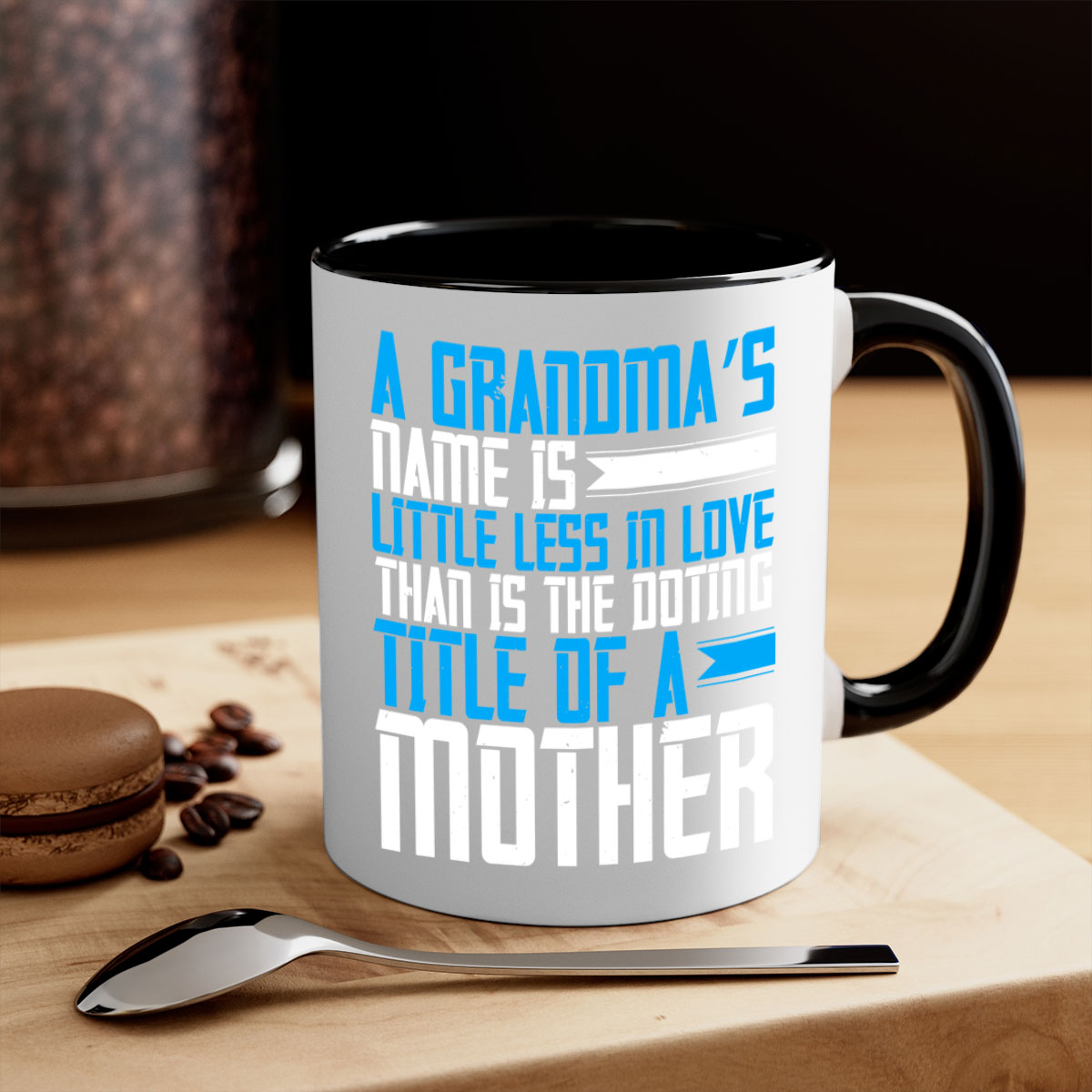 A stylish two-tone ceramic mug with a colored handle and interior, featuring a heartfelt grandma-themed design.