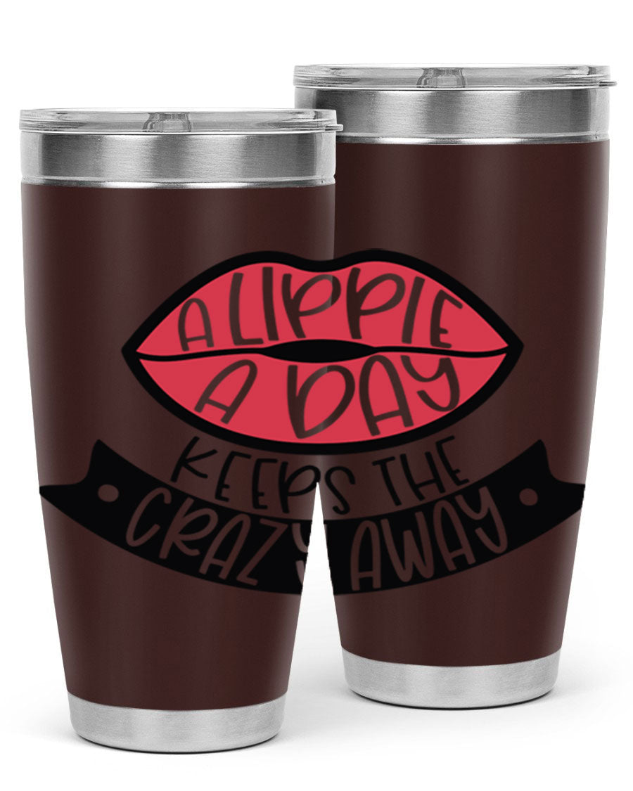A stylish 20oz stainless steel tumbler with a fun phrase, featuring a drink-thru lid and double wall vacuum insulation.