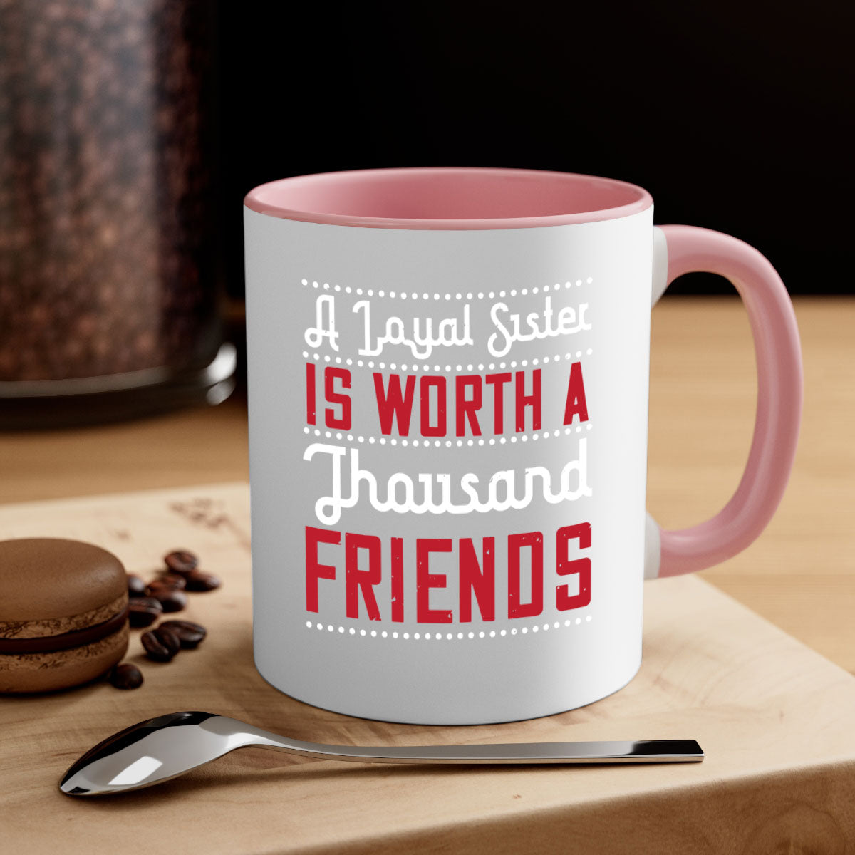 A two-tone ceramic mug with the phrase 'A Loyal Sister is Worth a Thousand Friends' in stylish font, featuring a colored handle and glossy finish.