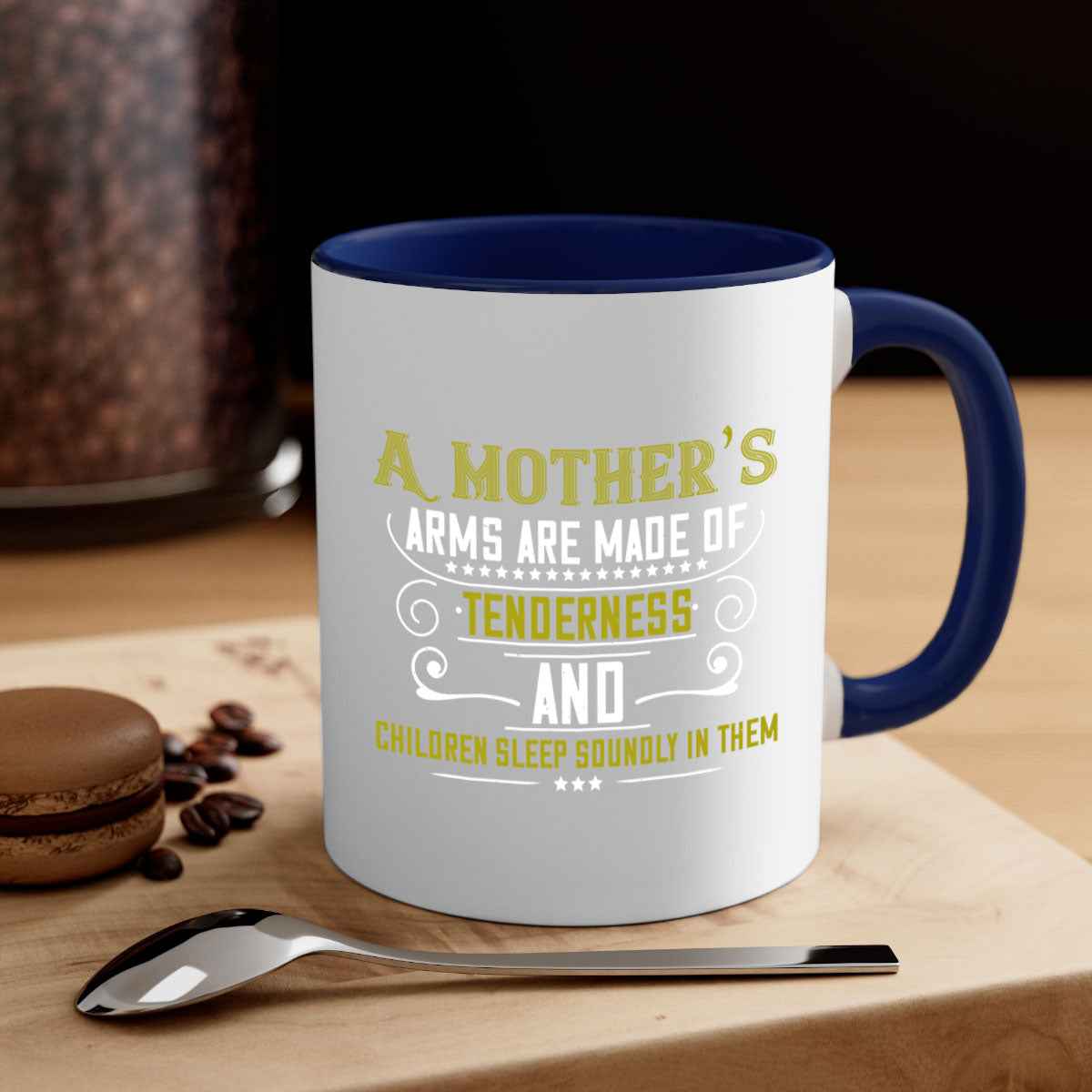 A stylish two-tone coffee mug with a colored handle and glossy finish, featuring the text 'A Mother's Arms Are Made of 249#'.