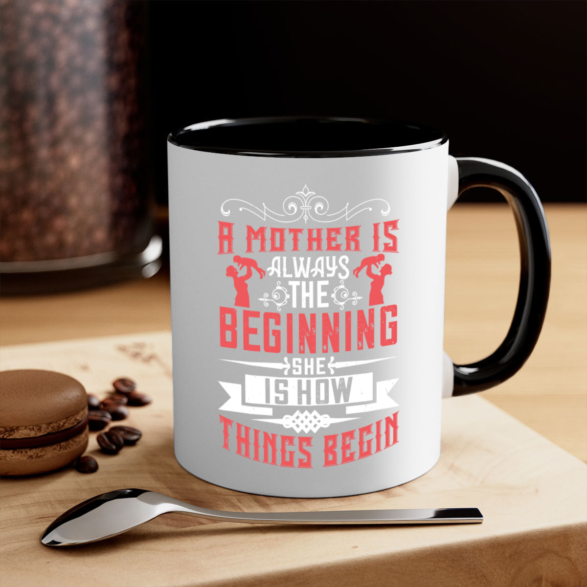 Ceramic mug with a two-tone design featuring the phrase 'A Mother is Always the Beginning' in elegant typography, available in multiple colors.