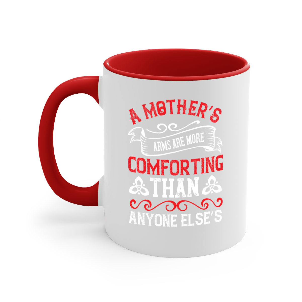 A two-tone ceramic mug with a colored handle and interior, featuring the phrase 'A Mother’s Arms Are More Comforting Than Anyone Else’s'.