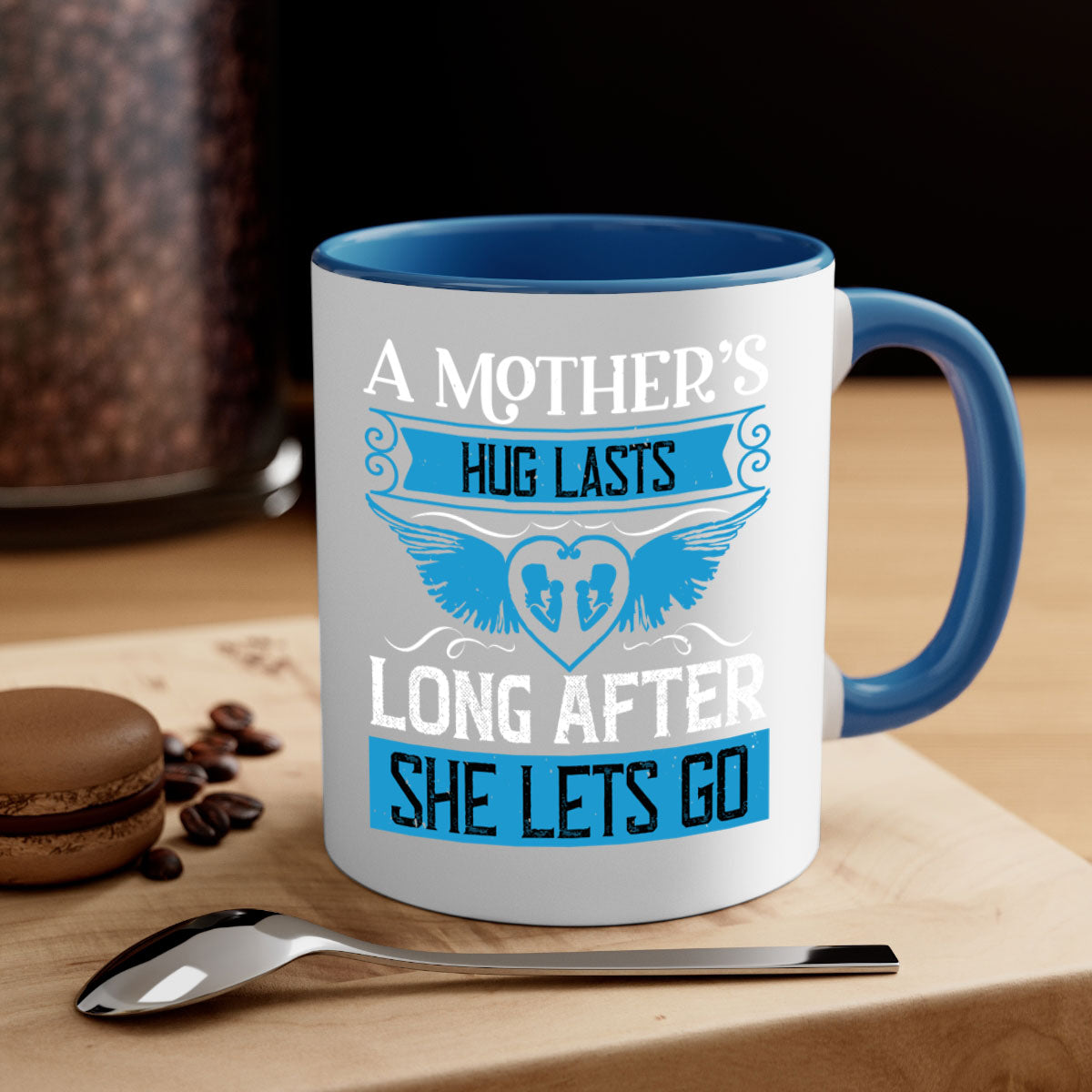 A stylish two-tone coffee mug with a colored handle and glossy finish, perfect for Mother's Day gifts.