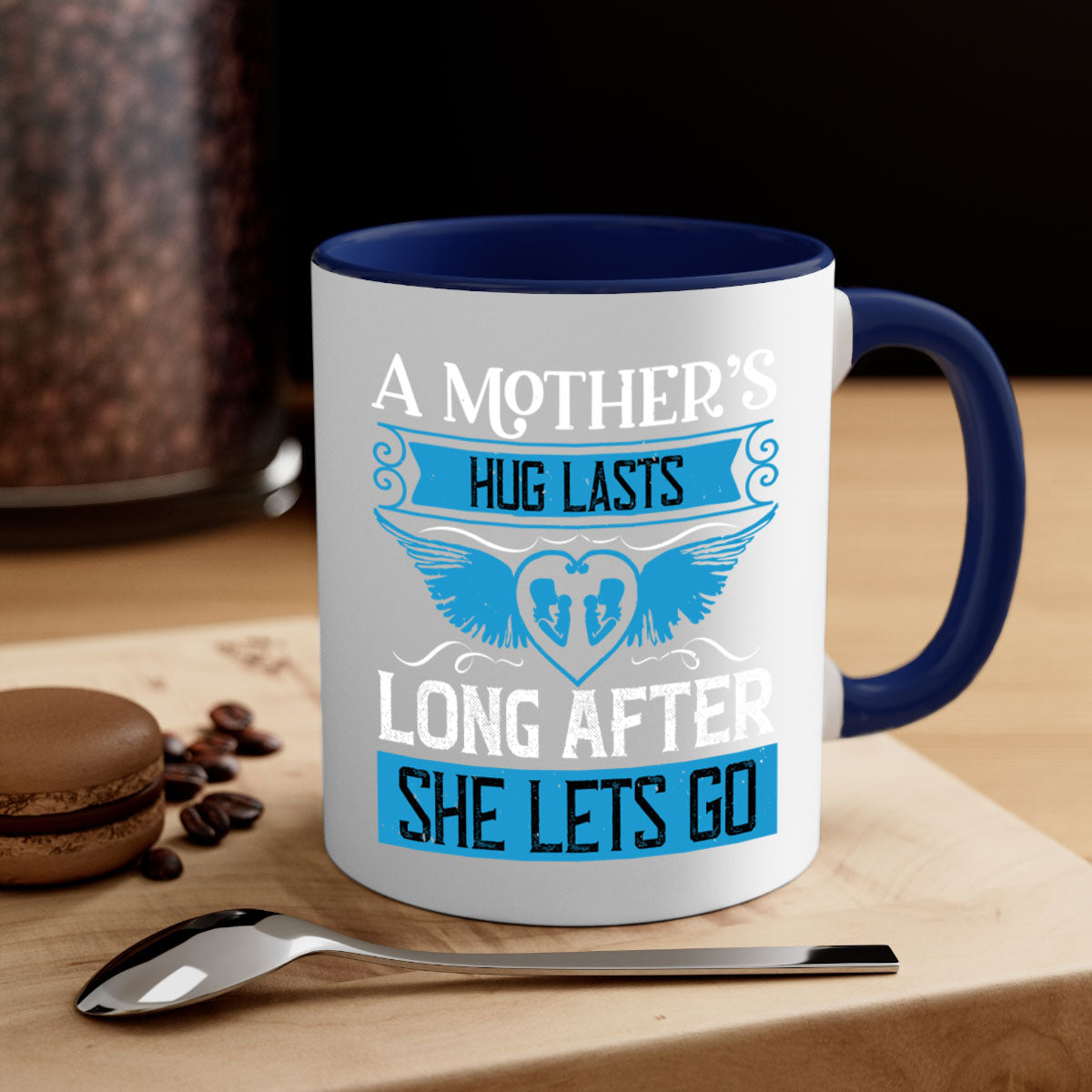 A stylish two-tone coffee mug with a colored handle and glossy finish, perfect for Mother's Day gifts.