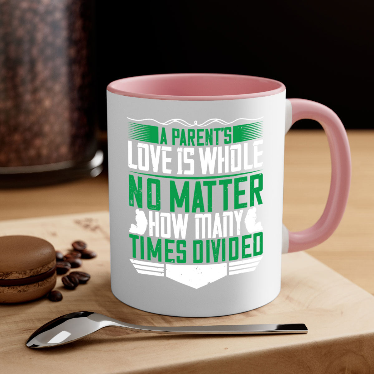 A two-tone ceramic mug with a glossy finish, featuring a colored handle and interior, showcasing the phrase 'A Parent’s Love is Whole No Matter How Many Times Divided'.