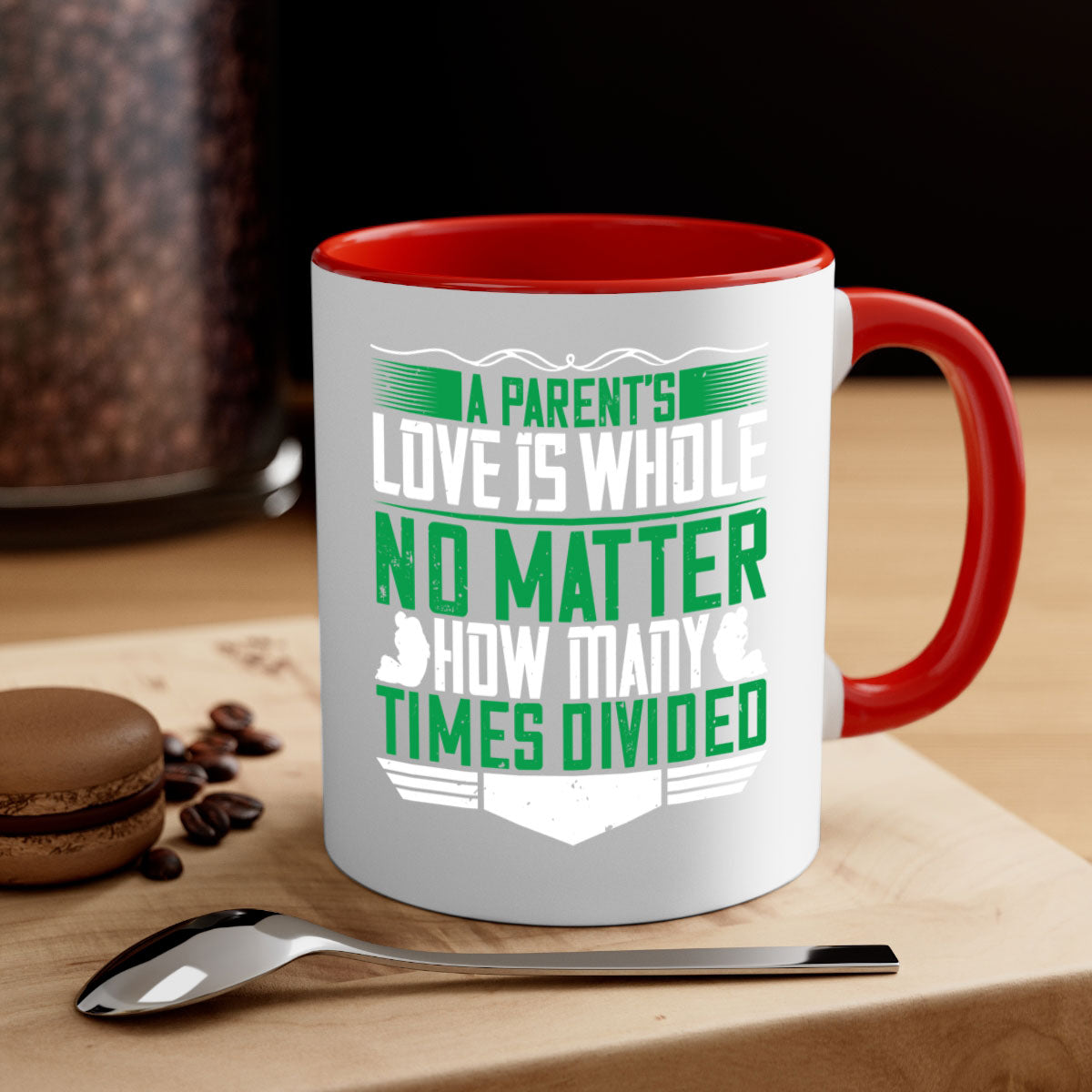 A two-tone ceramic mug with a glossy finish, featuring a colored handle and interior, showcasing the phrase 'A Parent’s Love is Whole No Matter How Many Times Divided'.
