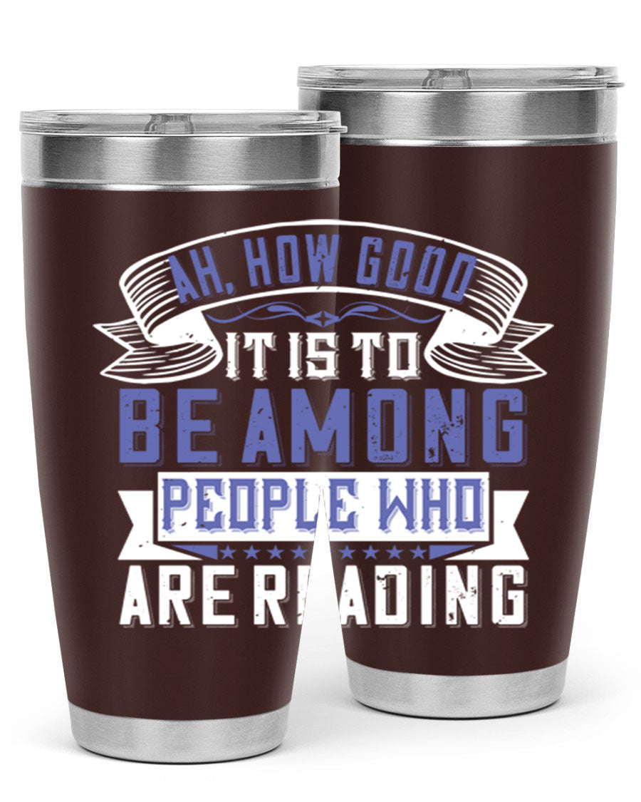 A stylish 20oz and 30oz stainless steel tumbler with a drink-thru lid, perfect for keeping beverages hot or cold while reading.