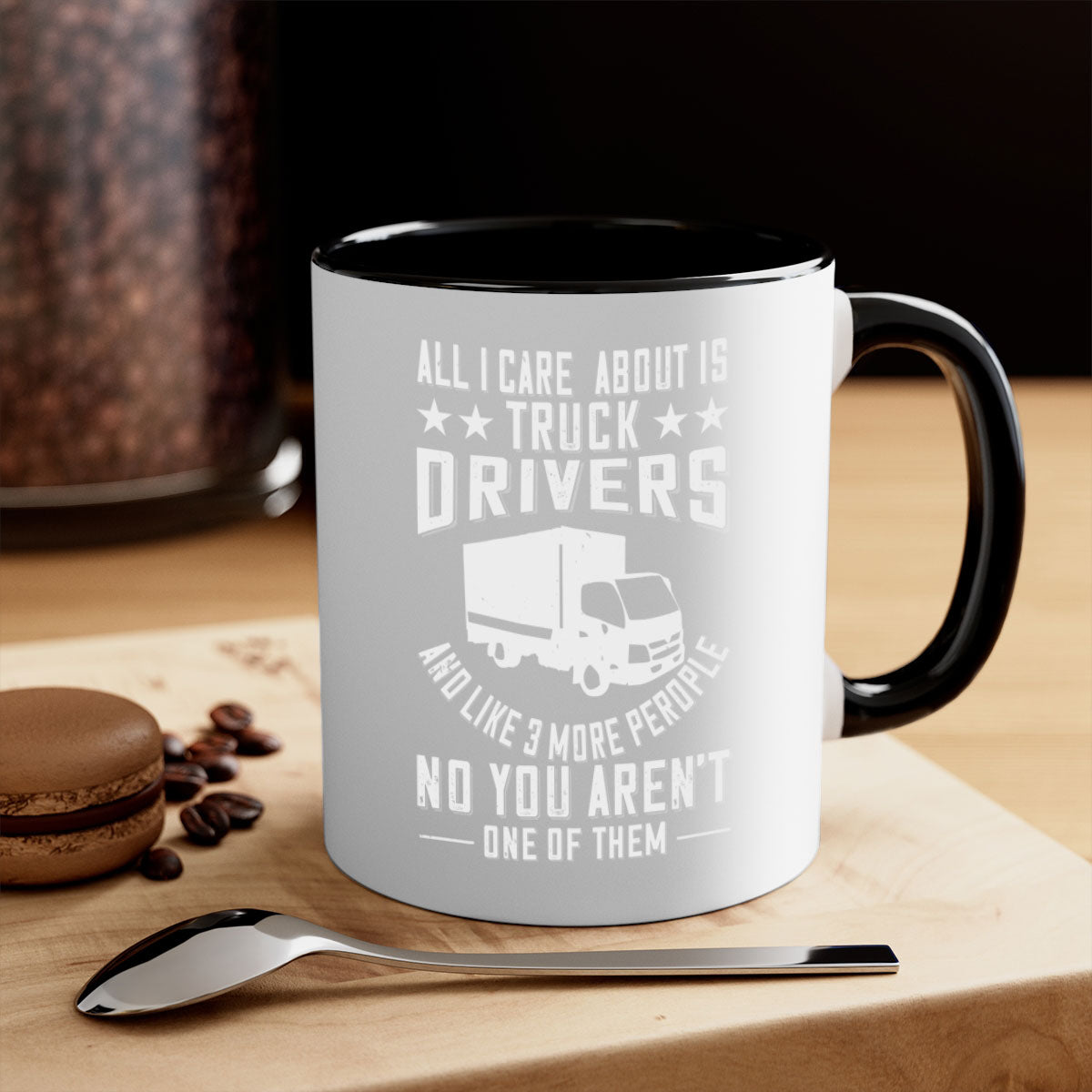 A stylish two-tone coffee mug featuring the phrase 'All I Care About Is Truck Drivers', available in multiple colors with a glossy finish.