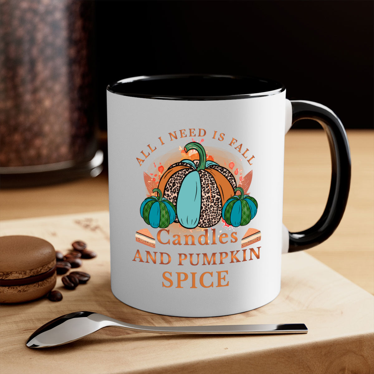 Two-tone ceramic mug with colored handle and glossy finish, featuring the phrase 'All I Need Is Fall Candles And Pumpkin Spice'.