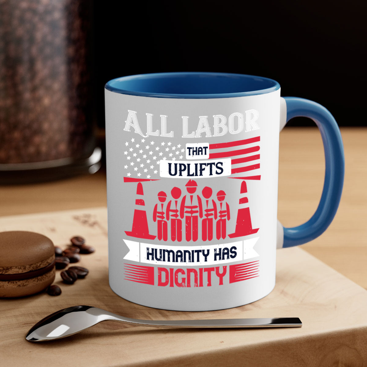 Two-tone ceramic mug with a glossy finish, featuring the phrase 'All Labor That Uplifts Humanity Has Dignity' in stylish typography.