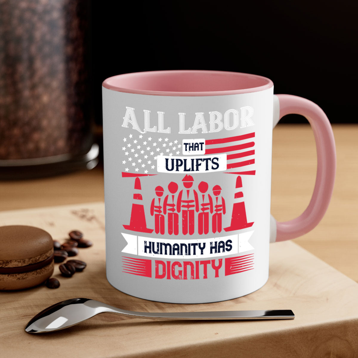 Two-tone ceramic mug with a glossy finish, featuring the phrase 'All Labor That Uplifts Humanity Has Dignity' in stylish typography.