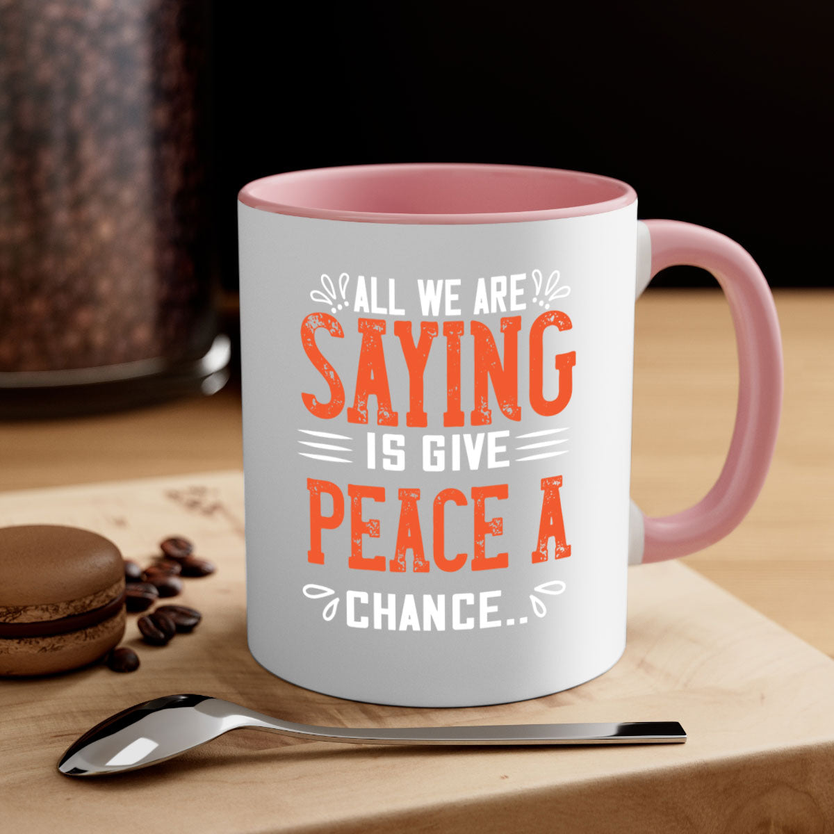 All We Are Saying Vegan Mug with colorful handle and glossy finish, available in multiple sizes.