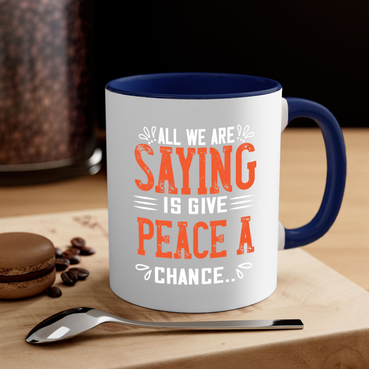All We Are Saying Vegan Mug with colorful handle and glossy finish, available in multiple sizes.