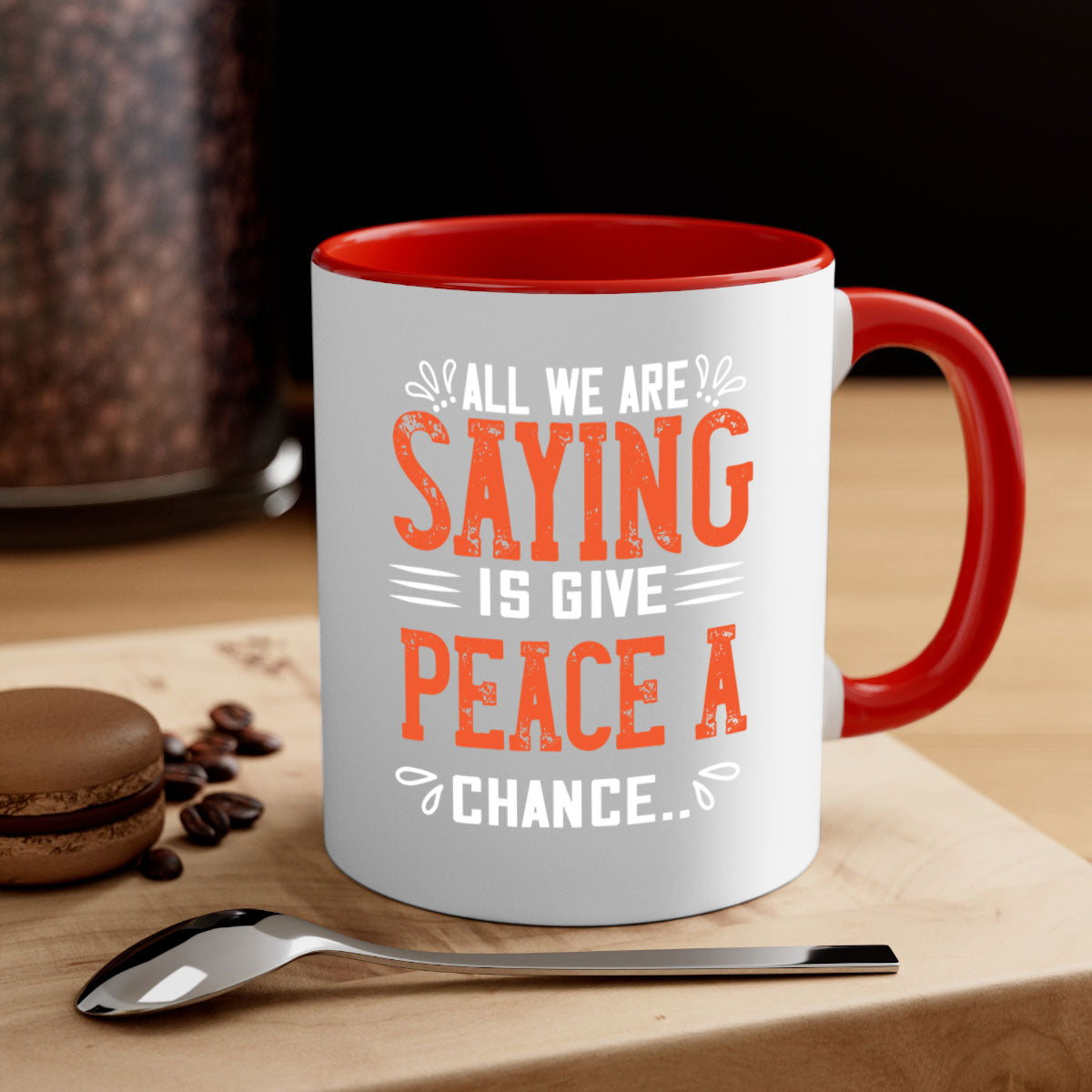 All We Are Saying Vegan Mug with colorful handle and glossy finish, available in multiple sizes.