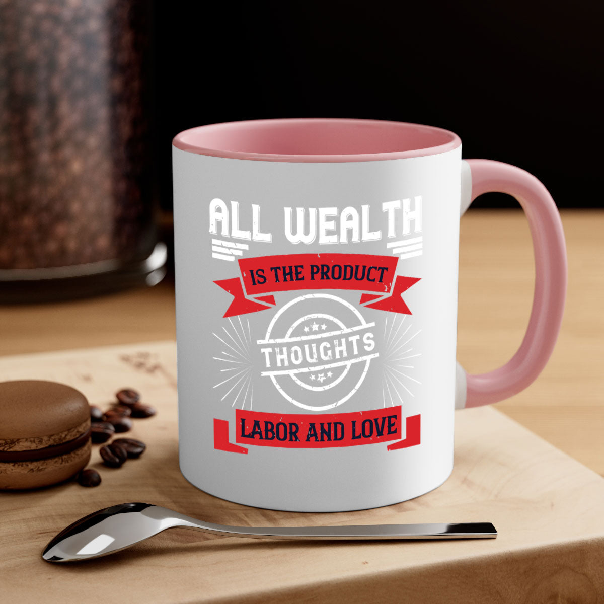 A stylish two-tone ceramic mug featuring the phrase 'All Wealth is the Product of Thoughts, Labor, and Love' with a glossy finish and colored handle.
