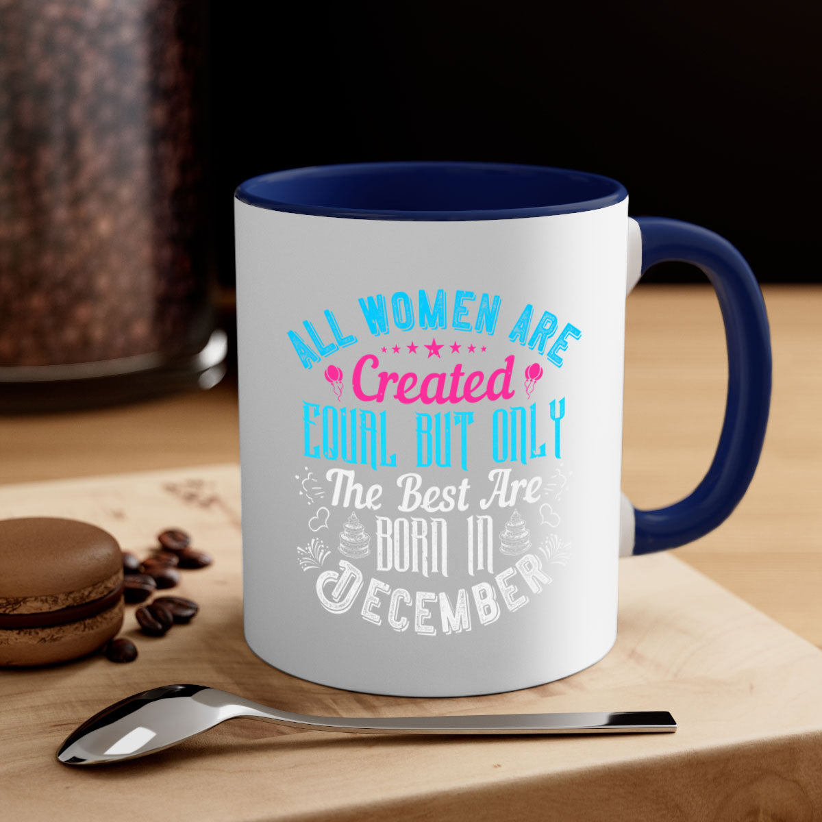 Two-tone ceramic mug with colored handle and interior, celebrating December birthdays.