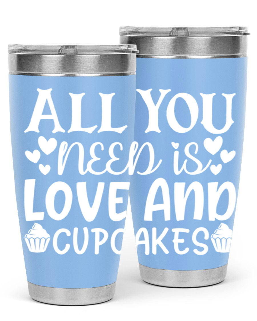 A stylish 'All You Need Is Love and Cupcakes' tumbler in stainless steel, featuring a vibrant design, perfect for hot and cold beverages.