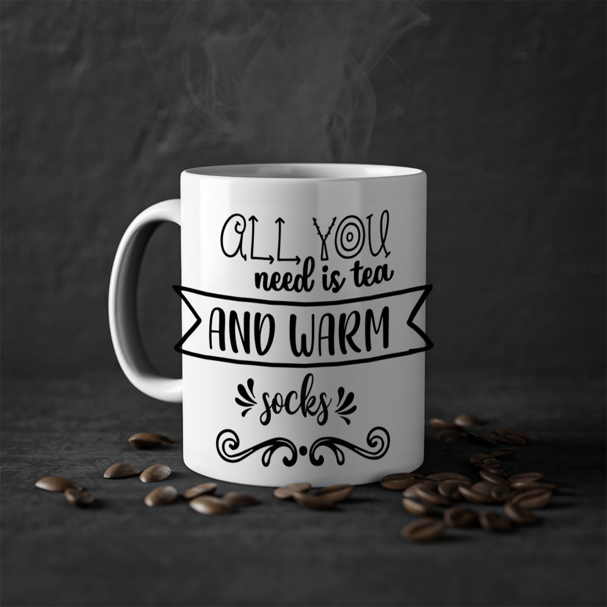 A stylish two-tone ceramic mug with a colored handle and interior, featuring the phrase 'All You Need is Tea and Warm Socks'.