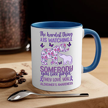 Alzheimer's Awareness Purple Elephant Mug with glossy finish and colorful handle, available in two sizes.