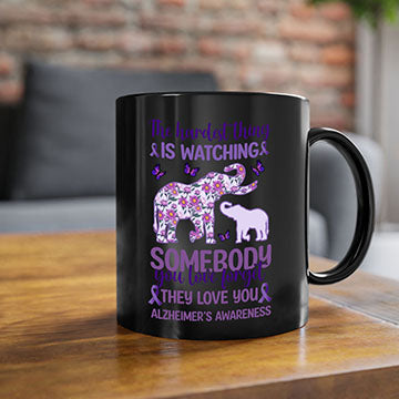 Alzheimer's Awareness Purple Elephant Mug with glossy finish and colorful handle, available in two sizes.