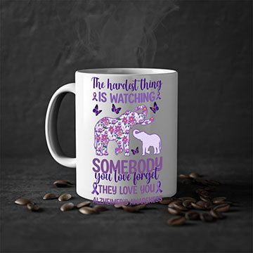 Alzheimer's Awareness Purple Elephant Mug with glossy finish and colorful handle, available in two sizes.